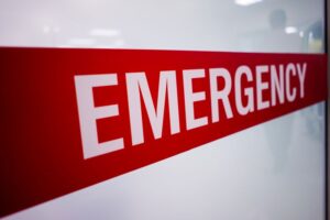 Red and white emergency sign